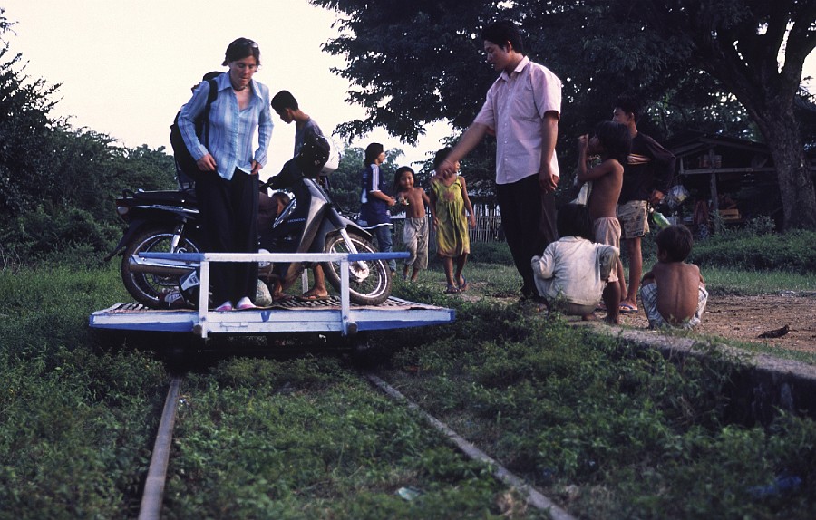 Cambodian rail Battambong.jpg - The official trains run at 20km/h average, and on this section of track, only once per week.  The bamboo train is not any quicker, but the suspension is probably much worse.